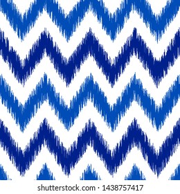 Patrón uzbeko de tela de seda ikat, colores azul índigo y blanco. Patrón geométrico impecable, basado en el estilo de tela ikkat. Ilustración vectorial. imitación vectorial de textura alfombra de alfombra.