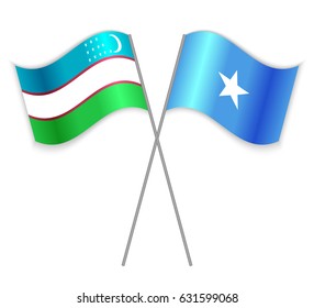 Uzbek and Somali crossed flags. Uzbekistan combined with Somalia isolated on white. Language learning, international business or travel concept.