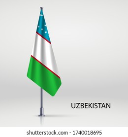 Uzbekistan hanging flag on flagpole