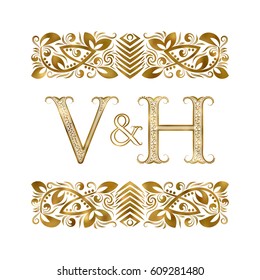 V and H vintage initials logo symbol. The letters are surrounded by ornamental elements. Wedding or business partners monogram in royal style.