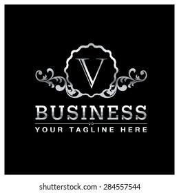 V letter Silver Luxury Logo template flourishes calligraphic elegant ornament lines. Business sign, identity for Restaurant, Royalty, Hotel, Heraldic, Jewelry, Fashion and other vector illustration