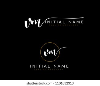 V M Initial handwriting logo vector. Hand lettering for designs.