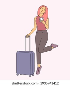 Vacation or business trip concept. Young smiling woman as traveller bring lugage bag. Travel abroad on vacation adventure lifestyle