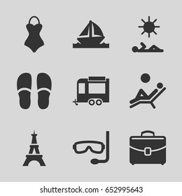 Vacation icons set. set of 9 vacation filled icons such as eiffel tower, slippers, trailer, case, boat, man laying in sun, man laying in the sun, swimsuit
