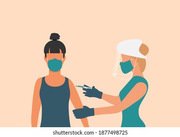 vaccination concept.  A doctor wearing a face protective medical mask for protection from virus COVID-19 disease with a syringe doing an injection of vaccine to the female patient.