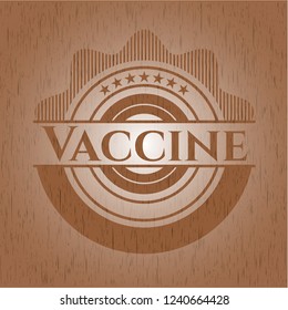 Vaccine badge with wood background