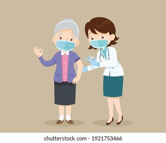 Vaccine Concept Doctor Injection Vaccine Elderly Woman, Doctor Giving A Coronavirus Vaccine To Old Woman.Doctor Successful Covid-19 Vaccination For Elderly People.Senior Man Wearing Face Mask Show