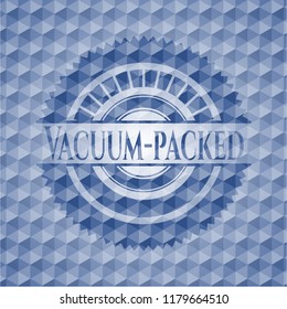 Vacuum-packed blue badge with geometric pattern.