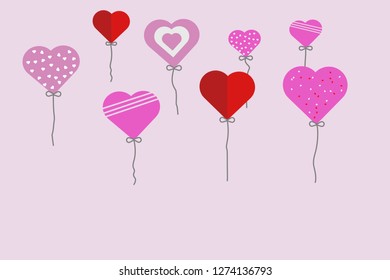Valentine balloons on the pink background 