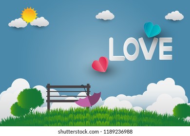 Valentine card day, umbrella with chair in public park bright sky With the letter love