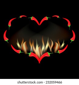 Valentine card red pepper pod laid out in the shape of heart in fire