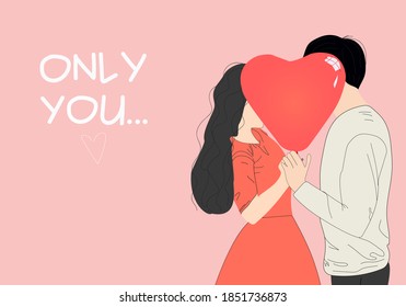 Valentine couple. Beauty girl and her handsome boyfriend holding a heart-shaped balloon and kissing. Happy joyful family. Only you. Happy Valentine's Day
