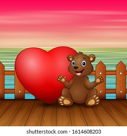 Valentine day concept with funny baby bear sitting with heart