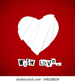 Valentine heart from paper cut outs and with text under.