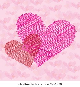 Valentine hearts connected with safety pin