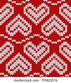 Valentine jacquard seamless pattern. Red and white background. Knitted texture. Northern style. Vector illustration.