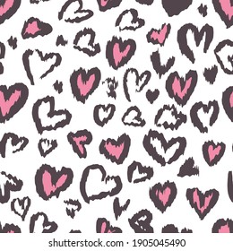 Valentine Leopard or cheetah seamless pattern. Trendy animal print. Spotted pink and dark gray hearts imitate jaguar fur. Vector background for textile, fabric, wallpaper, wrapping paper, etc.