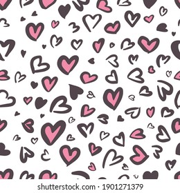 Valentine Leopard or jaguar seamless pattern. Trendy animal print. Spotted pink and dark gray hearts imitate cheetah fur. Vector background for fabric, textile, wallpaper, wrapping paper, etc. 