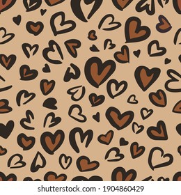 Valentine Leopard or jaguar seamless pattern. Trendy animal print. Spotted hearts imitate cheetah fur. Vector background for fabric, textile, wallpaper, wrapping paper, etc. 