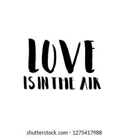 Valentine lettering phrase “ Love is in the air”. Simple Hand drawn lettering. Perfect for Valentine day,Wedding, greeting cards etc.