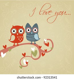 Valentine love card with cute romantic owls and hearts