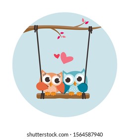Valentine owls in love in a swing