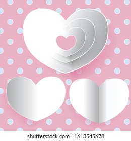 Valentine white paper cut on pink with blue polkadot background