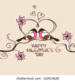 Valentine's card with couple of kissing birds sitting on branches