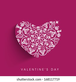 Valentines day background with beautiful floral decorated heart on pink.