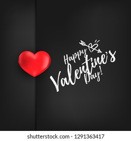 Valentine's Day background with beautiful red heart stick on black background with Happy valentine's Day text. Concept of love and Valentine's day. Love concept for background, advertising and banner.