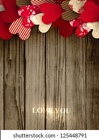 Valentine`s Day background with free space for your text decorated with paper hearts.