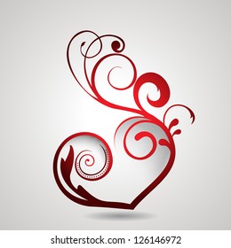 Valentine's Day background, gift or greeting card with red floral heart on grey background.