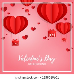 Valentine's day background of a group of heart shape hot air balloons in red color hanging gift box with love text, many little hearts and white frame on pink background with your copy space. 