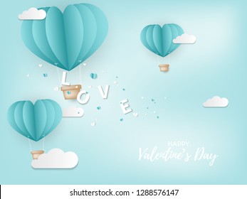 Valentine's Day background of LOVE text falling from blue heart shape hot air balloons and many tiny hearts on the blue sky with clouds and Happy Valentine's Day text. Concept of love in paper art.