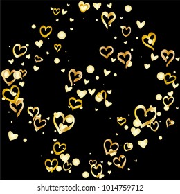 Valentines day background with random hand drawn falling golden hearts isolated on black.
