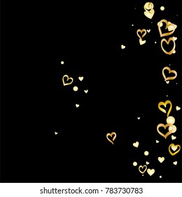 Valentines day background with random hand drawn falling golden hearts isolated on black.