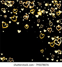 Valentines day background with random hand drawn falling golden hearts isolated on black.