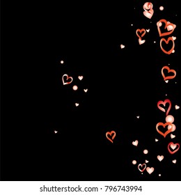 Valentines day background with random hand drawn falling red hearts isolated on black.