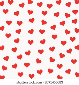 
Valentine's Day background with red hearts on a white background