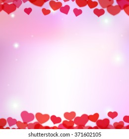 Valentines Day background with scattered blurred hearts