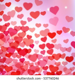 Valentines Day background with scattered blurred hearts