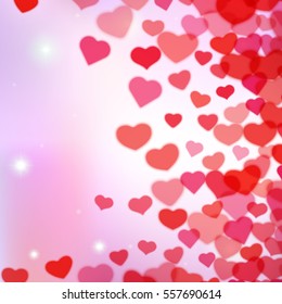 Valentines Day background with scattered blurred hearts