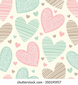 Valentines day background. Seamless pattern made of ornamental hearts of various size. Hearts pattern with lacy ornamentation and hatching.