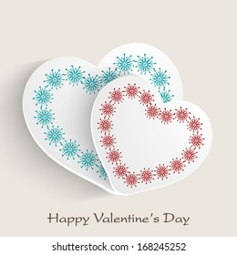 Valentines day background with sticky in heart shapes decorated with floral.. 