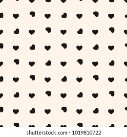 Valentines day background. Vector seamless pattern with black small rotated hearts on white backdrop. Abstract repeat monochrome geometric texture. Love romantic theme. Design for decor, gift paper
