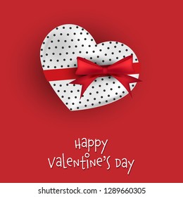 Valentine's Day background with white gift box in heart shape with red ribbon and Happy Valentine's Day text on red background. ​Love concept for background, advertising, banner and promotion.