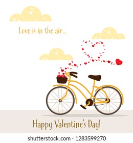 Valentine's Day background of yellow bicycle with tiny red heart fly from wicker basket go in the sky with cute cloud background with Love is in the air text and Happy Valentine's Day text. 