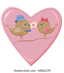 Valentine's day birds holding a valentine in their beaks