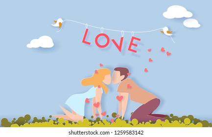 Valentines day card with couple in love kissing on green grass. Vector paper art illustration. Paper cut and craft style.