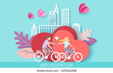 Valentines day card with couple riding bicycle on red hearts background with modern sity and air balloons. Vector paper art illustration. Paper cut and craft style.